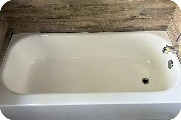 White refinished bathtub in Home – smooth glossy finish after professional reglazing