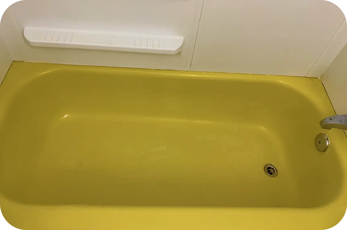 Yellow refinished bathtub in Home – vibrant color option after bathtub reglazing service